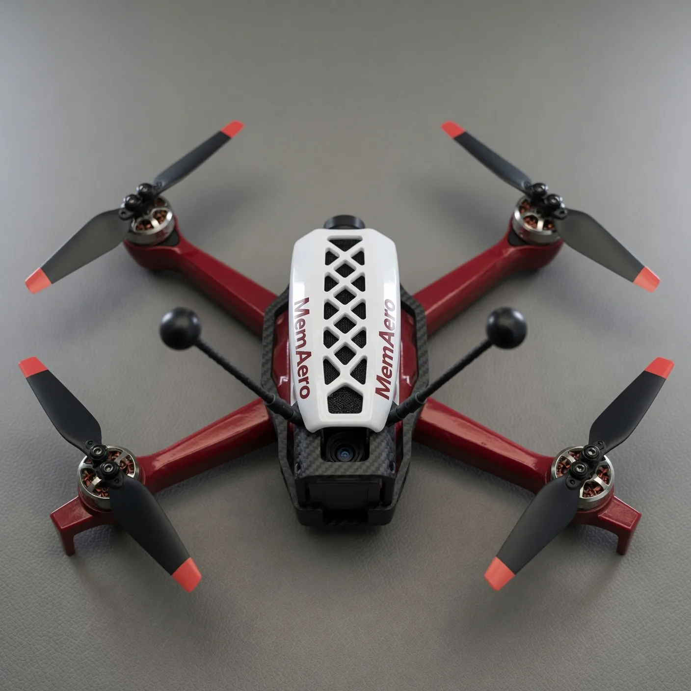 MemAero Aero 3 7-inch FPV drone, top-down view showing lattice canopy and carbon frame (design render)